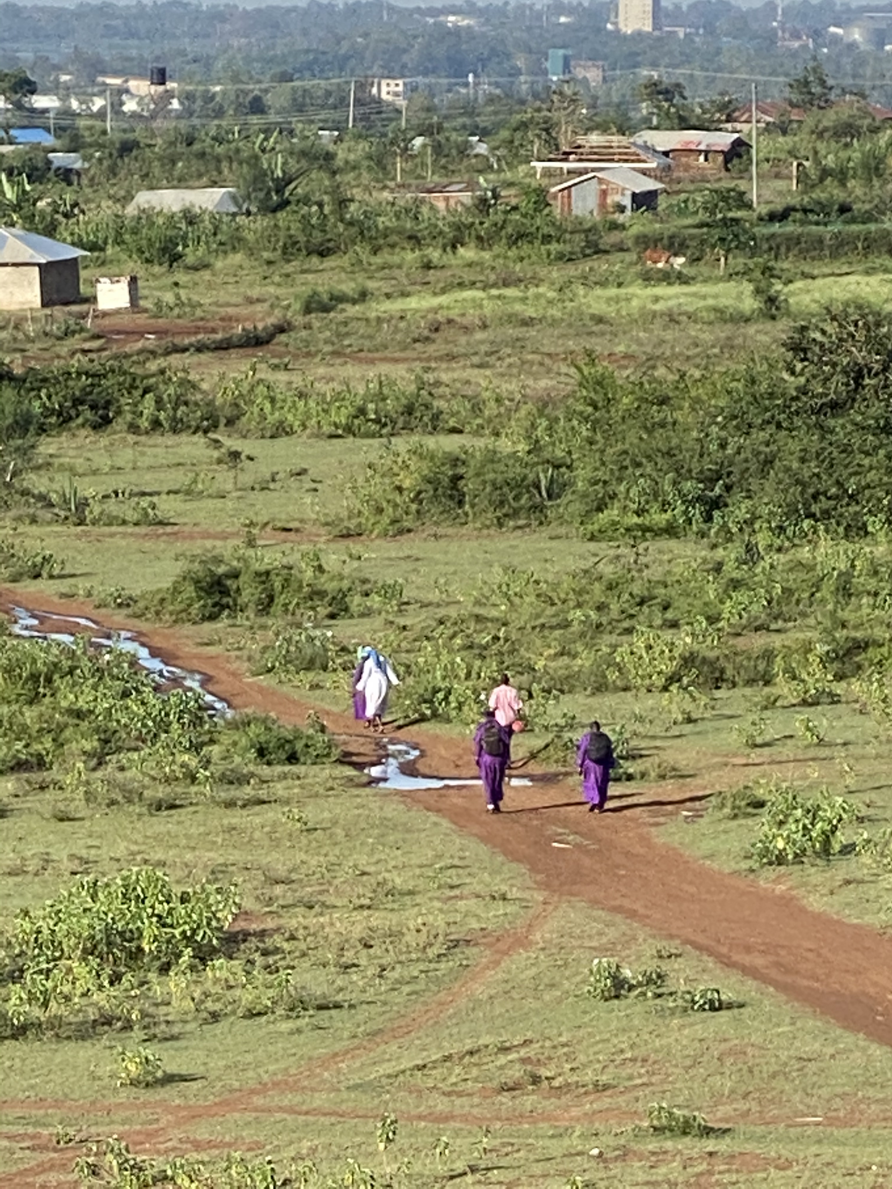 Local villagers walking to church on Sunday morning.