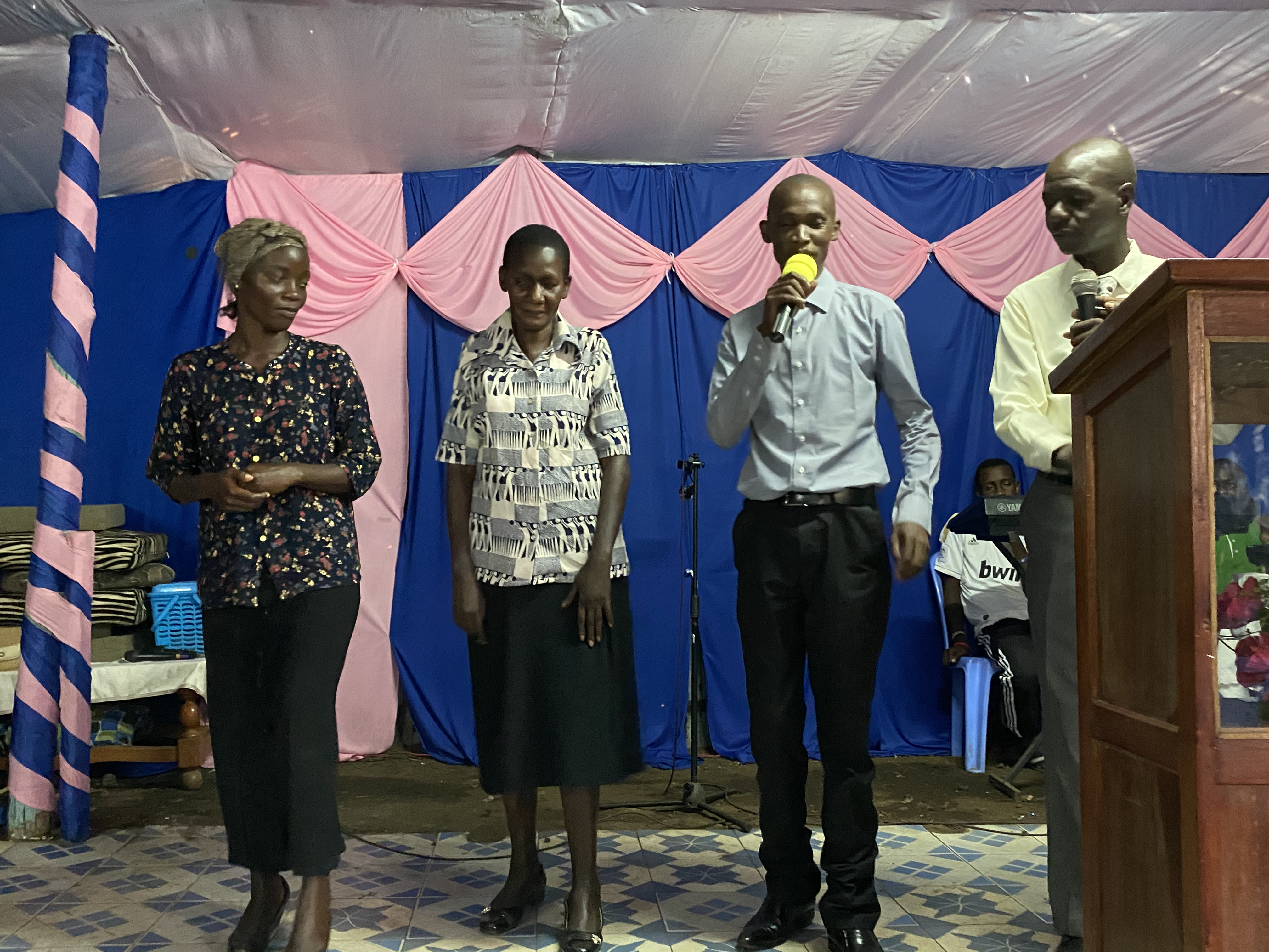 Pastor Evans speaking in Manyatta