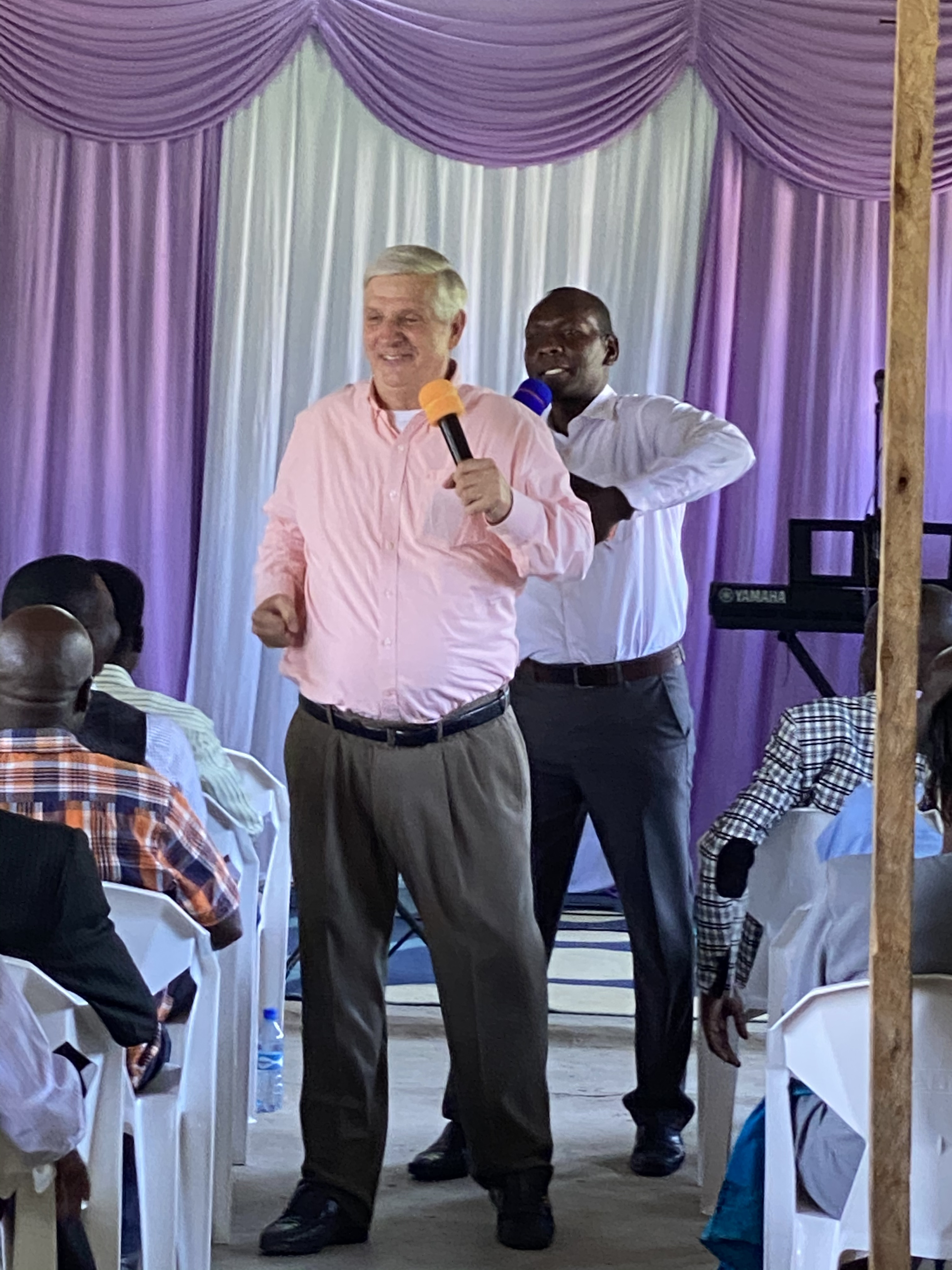 Apostle John with interpreter Gabiel Kole at Crossroads church in Kisumu.   Demonstrating some in the pulpit "strut like a banty rooster"!!  You just had to hear the message :-)