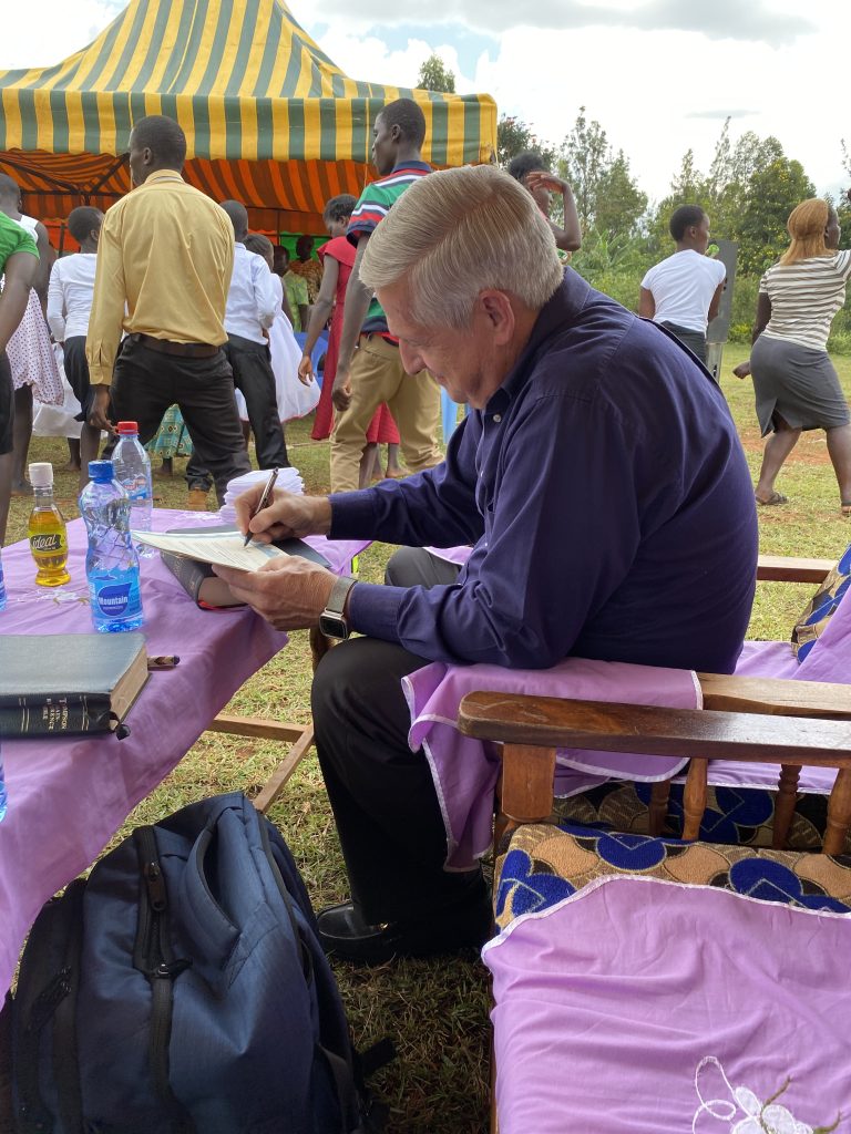 Apostle John signing the ordination certificates