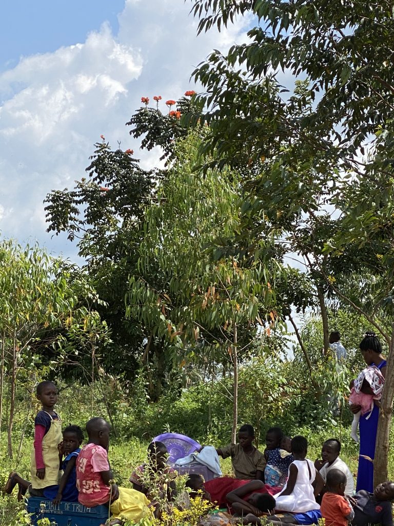 Children listening off to the side