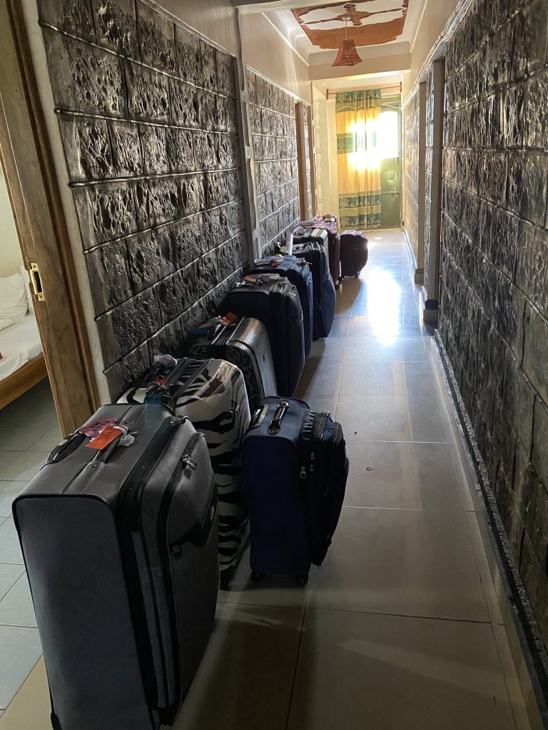 Moving around the country .  We were there for 30 days and had 8 suitcases and 8 carryons.